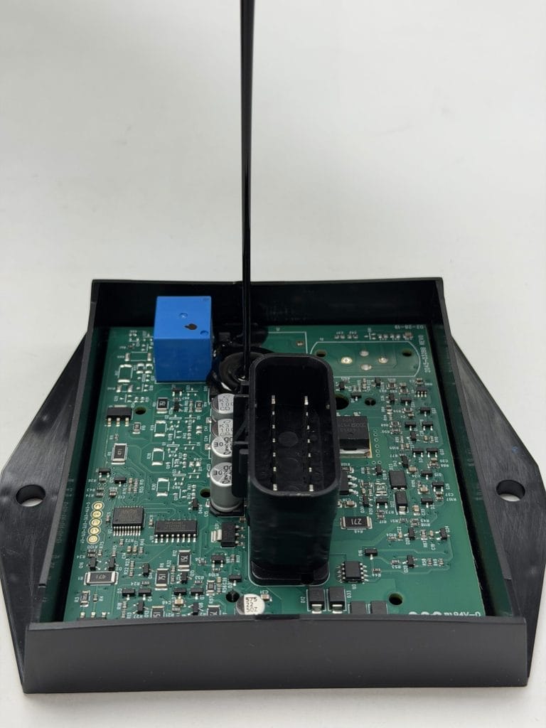 Electronic control module encapsulated in a potted housing