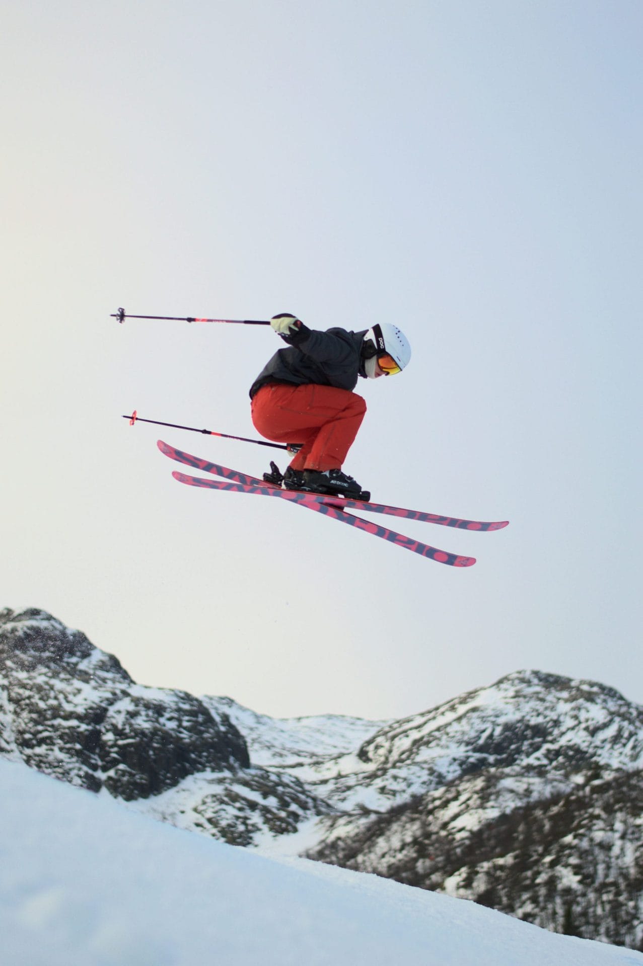 Skier jumping on a snow-covered mountain